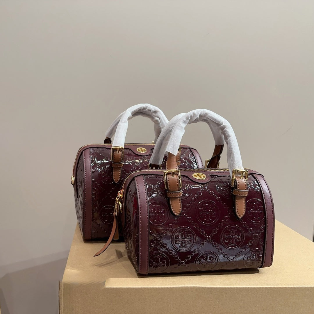 【送料0/国内即発】トリー バーチTモノグラムミニエンボスメタルシャイニーバケットバッグ