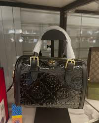 【送料0/国内即発】トリー バーチTモノグラムミニエンボスメタルシャイニーバケットバッグ