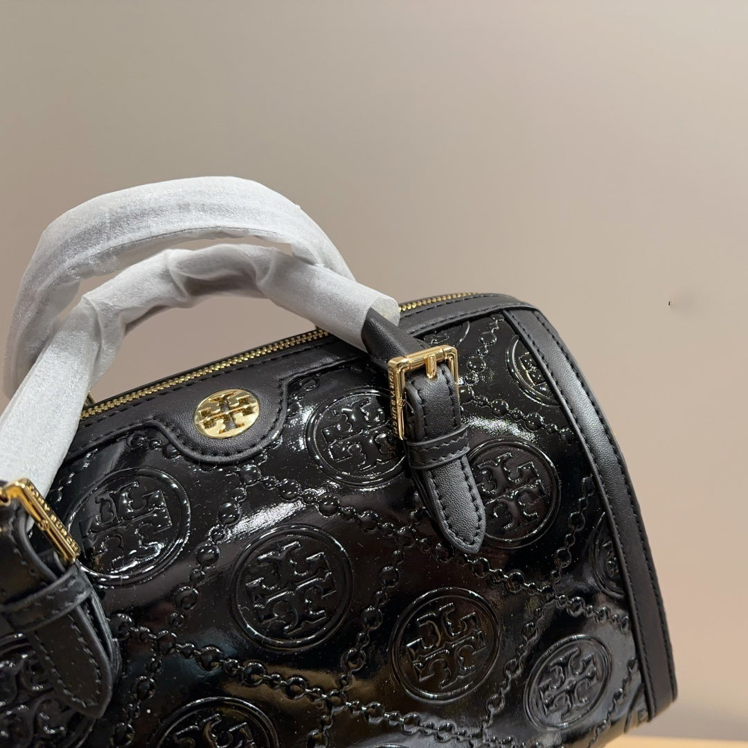 【送料0/国内即発】トリー バーチTモノグラムミニエンボスメタルシャイニーバケットバッグ